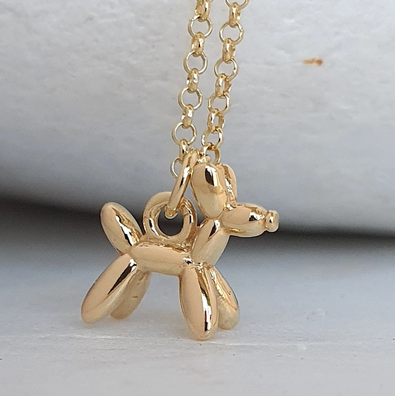 naszyjnik pozłacany piesek.jpg